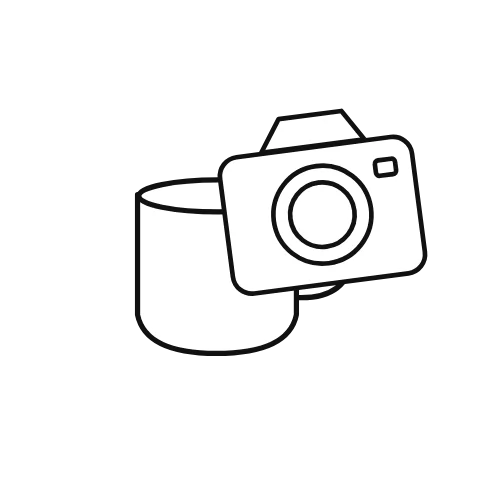 An illustrated camera moves across its companion for a closer look; mug supplies the accompanying visual context.